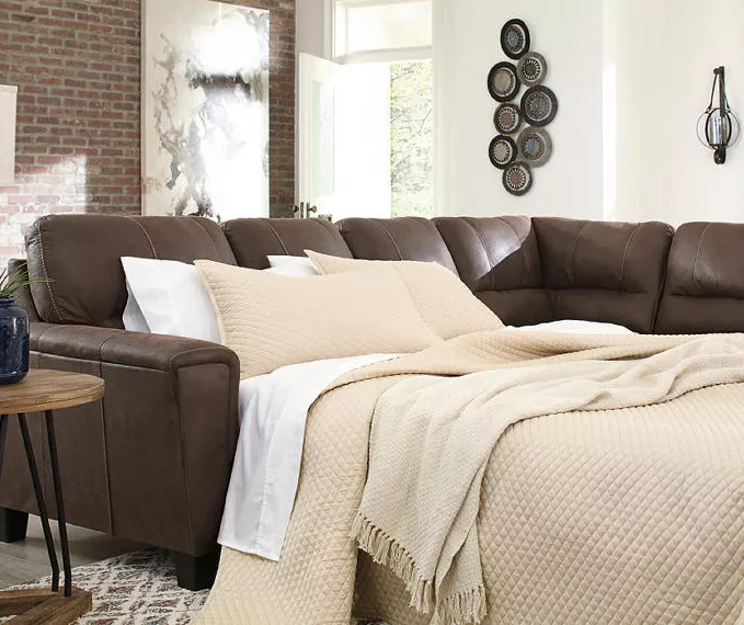 Signature Design By Ashley Navi Chestnut Faux Leather Sleeper Sectional With Right-Facing Chaise 1 Signature Design By Ashley Navi Chestnut Faux Leather Sleeper Sectional With Right-Facing Chaise